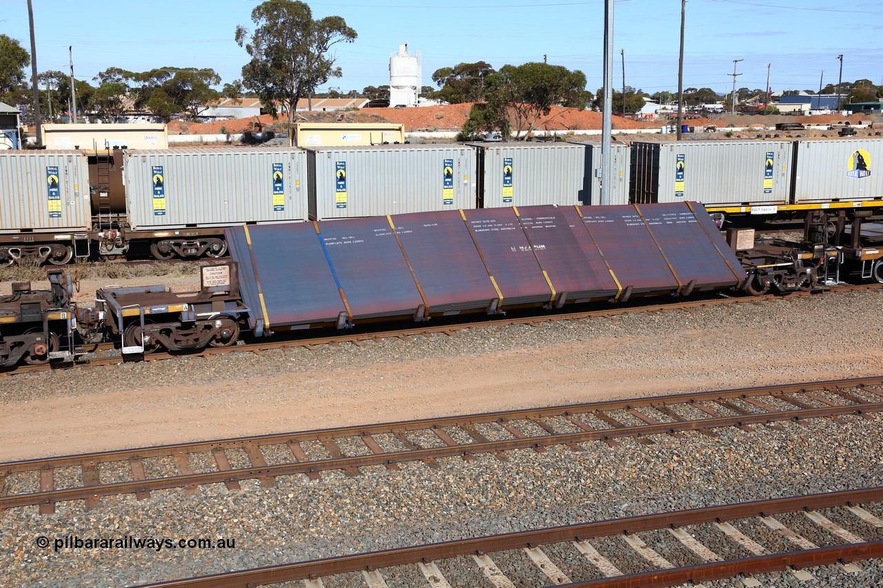 160531 9926
West Kalgoorlie, 1MP2 steel train, RKYY type wide steel plate tilt waggon RKYY 7108, one of twenty seven units built by AN Rail Islington Workshops in 1995-96. Loaded with steel plate.
Keywords: RKYY-type;RKYY7108;AN-Islington-WS;