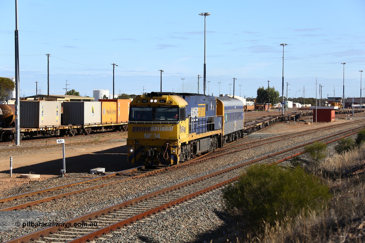 160531 9936
West Kalgoorlie, 3PM4 steel train, Goninan built GE model Cv40-9i NR class unit NR 94 serial 7250-06/97-300 shunts empty container waggons from the yard past the 651 km post, to put on the front of its train for the journey back east.
Keywords: NR-class;NR34;Goninan;GE;Cv40-9i;7250-06/97-300;
