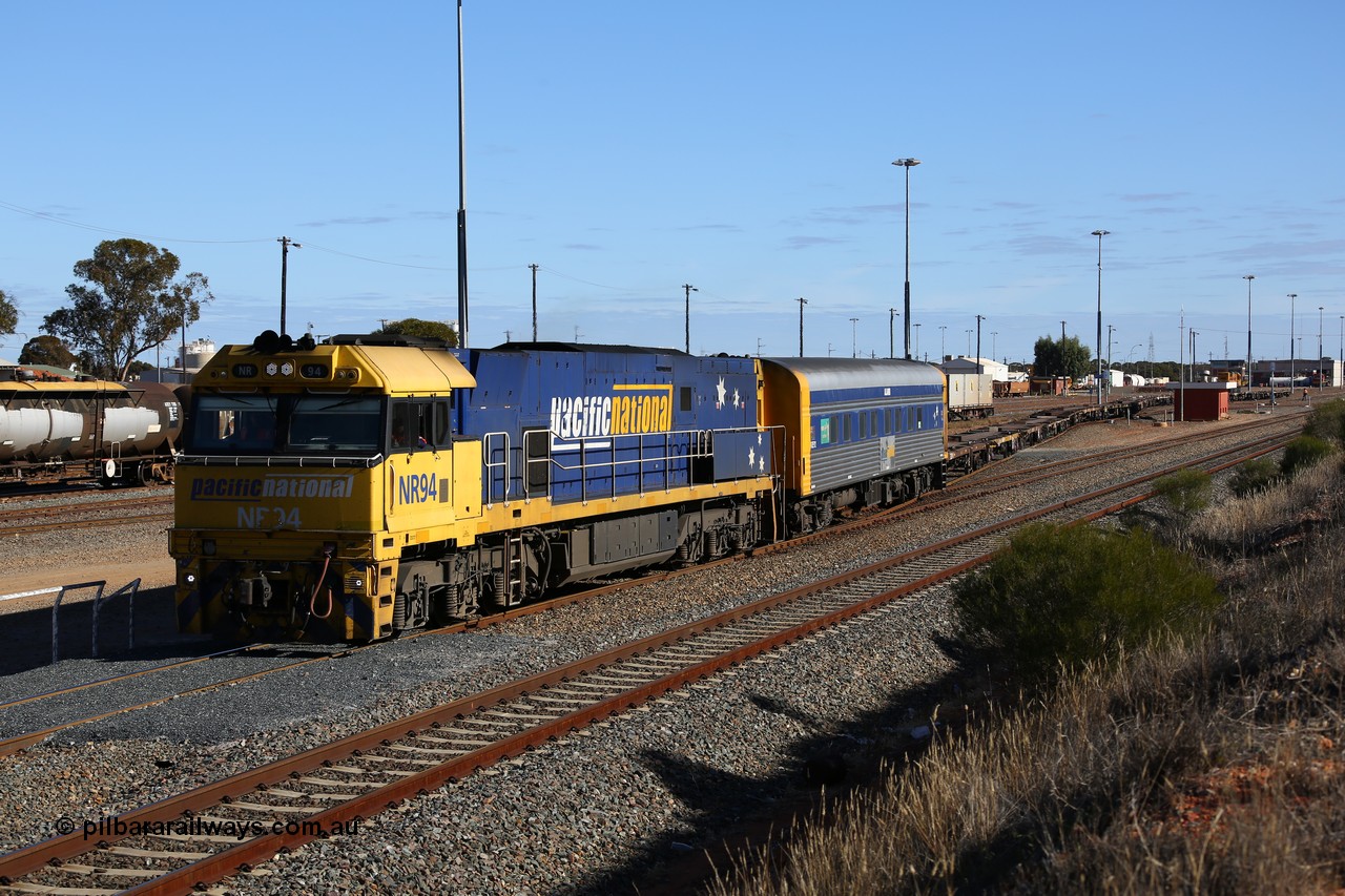 160531 9937
West Kalgoorlie, 3PM4 steel train, Goninan built GE model Cv40-9i NR class unit NR 94 serial 7250-06/97-300 shunts empty container waggons from the yard to put on the front of its train for the journey back east.
Keywords: NR-class;NR34;Goninan;GE;Cv40-9i;7250-06/97-300;