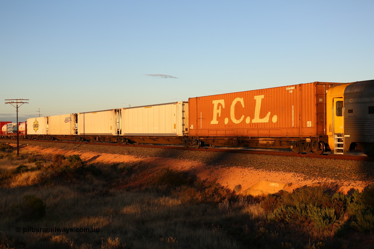 160601 10092
West Kalgoorlie, 2MP5 intermodal train, RRQY 8339 5-pack articulated skel waggon, built by Qiqihar Rollingstock Works in China as part of a forty one unit order in 2005/06, loaded with a 48' box and four 46' 6
