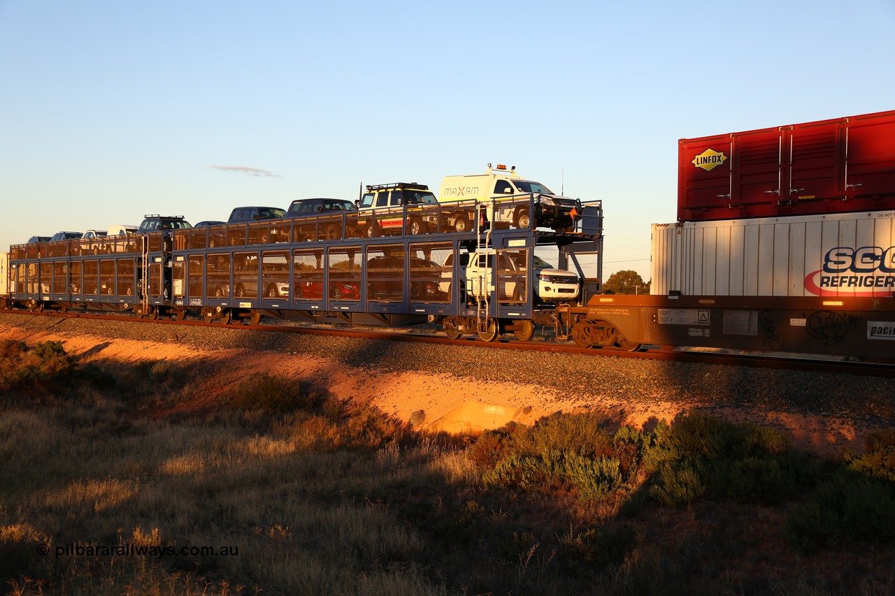 160601 10097
West Kalgoorlie, 2MP5 intermodal train, RMOY 01005, one of thirteen RMOY type double deck automobile waggons built in China by Qiqihar Rollingstock Works in 2014 with ten vehicles.
Keywords: RMOY-type;RMOY01005;Qiqihar-Rollingstock-Works-China;