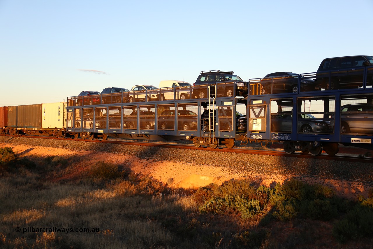 160601 10098
West Kalgoorlie, 2MP5 intermodal train, RMOY 01002, one of thirteen RMOY type double deck automobile waggons built in China by Qiqihar Rollingstock Works in 2014 with ten vehicles.
Keywords: RMOY-type;RMOY01002;Qiqihar-Rollingstock-Works-China;