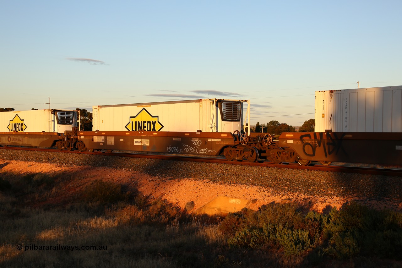 160601 10105
West Kalgoorlie, 2MP5 intermodal train, platform 1 of 5-pack RRRY 7011 well waggon set, one of nineteen built in China at Zhuzhou Rolling Stock Works for Goninan in 2005, Linfox 46' 6