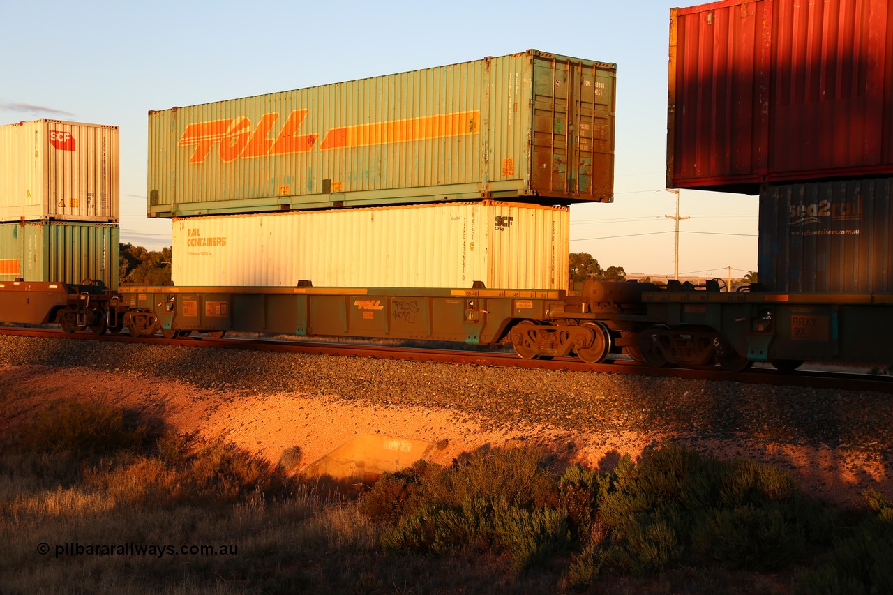 160601 10120
West Kalgoorlie, 2MP5 intermodal train, RRXY 9 platform 5 of 5-pack well waggon set, one of eleven built by Bradken Qld in 2002 for Toll from a Williams-Worley design with a 40' 4EG1 type Rail Containers box SCFU 412261 in the well with a 48' MEG1 type Toll box TCML 48448 on top.
Keywords: RRXY-type;RRXY9;Williams-Worley;Bradken-Rail-Qld;