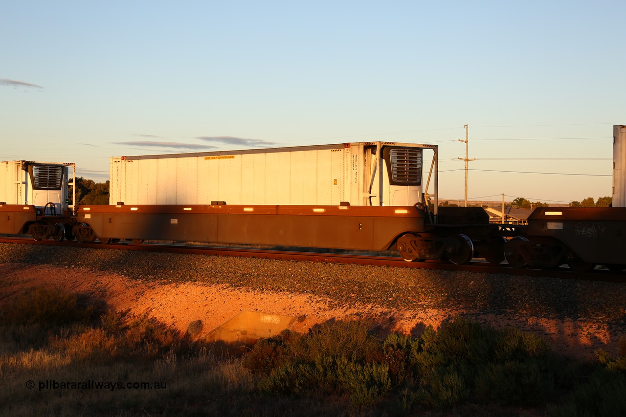 160601 10123
West Kalgoorlie, 2MP5 intermodal train, platform 3 of 5-pack RRRY 7008 well waggon set, one of nineteen built in China at Zhuzhou Rolling Stock Works for Goninan in 2005, ARLS 46' 6