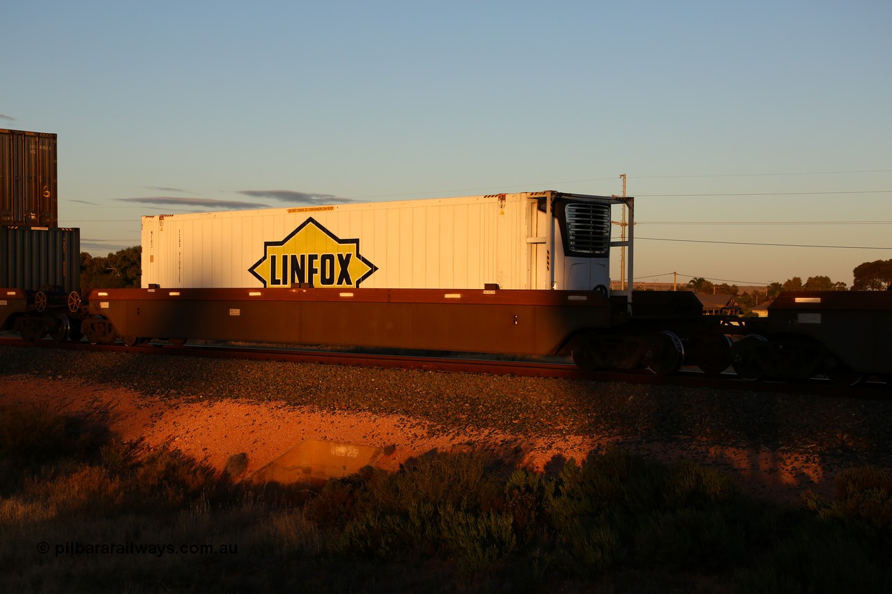 160601 10124
West Kalgoorlie, 2MP5 intermodal train, platform 2 of 5-pack RRRY 7008 well waggon set, one of nineteen built in China at Zhuzhou Rolling Stock Works for Goninan in 2005, Linfox 46' 6