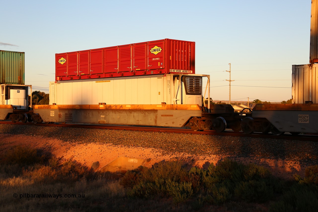 160601 10127
West Kalgoorlie, 2MP5 intermodal train, RQZY 7036 platform 4 of 5-pack well waggon set one of thirty two waggon sets built by Goninan NSW for National Rail in 1995-96, ARLS 46' 6
