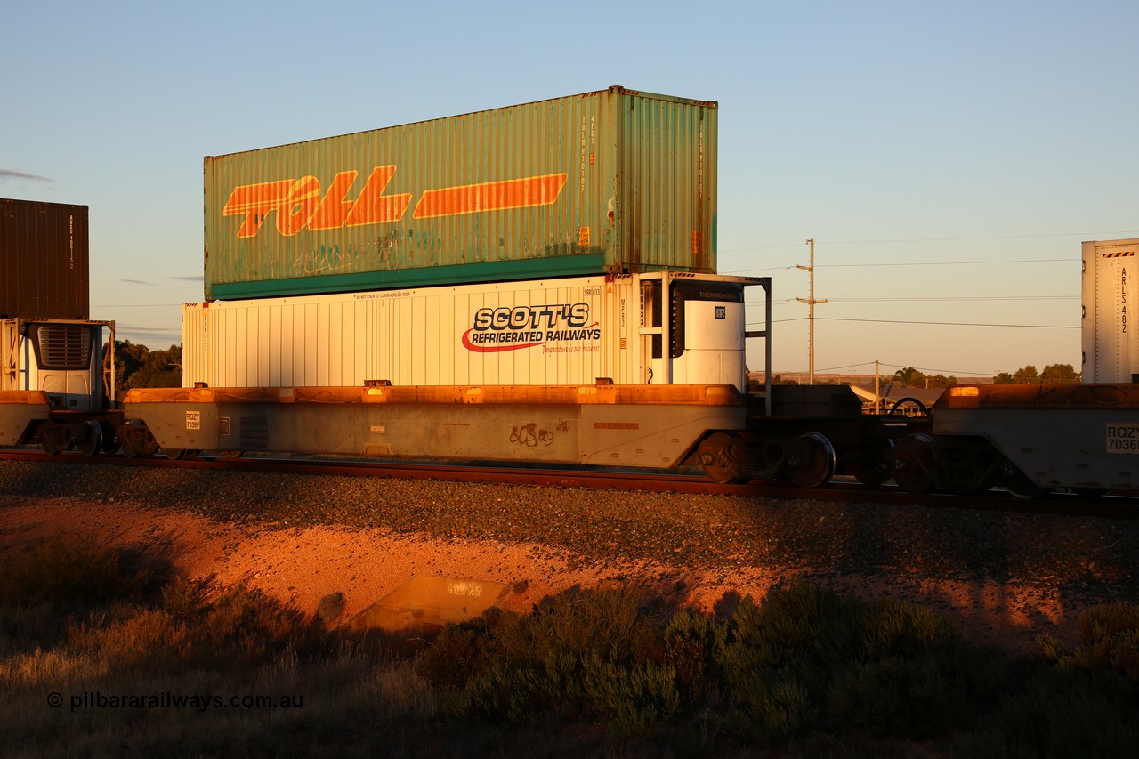160601 10128
West Kalgoorlie, 2MP5 intermodal train, RQZY 7036 platform 3 of 5-pack well waggon set one of thirty two waggon sets built by Goninan NSW for National Rail in 1995-96, double stacked with Toll 40' 4FG1 type box TOLH 910107 and Scott's Refrigerated Railways 46' 6