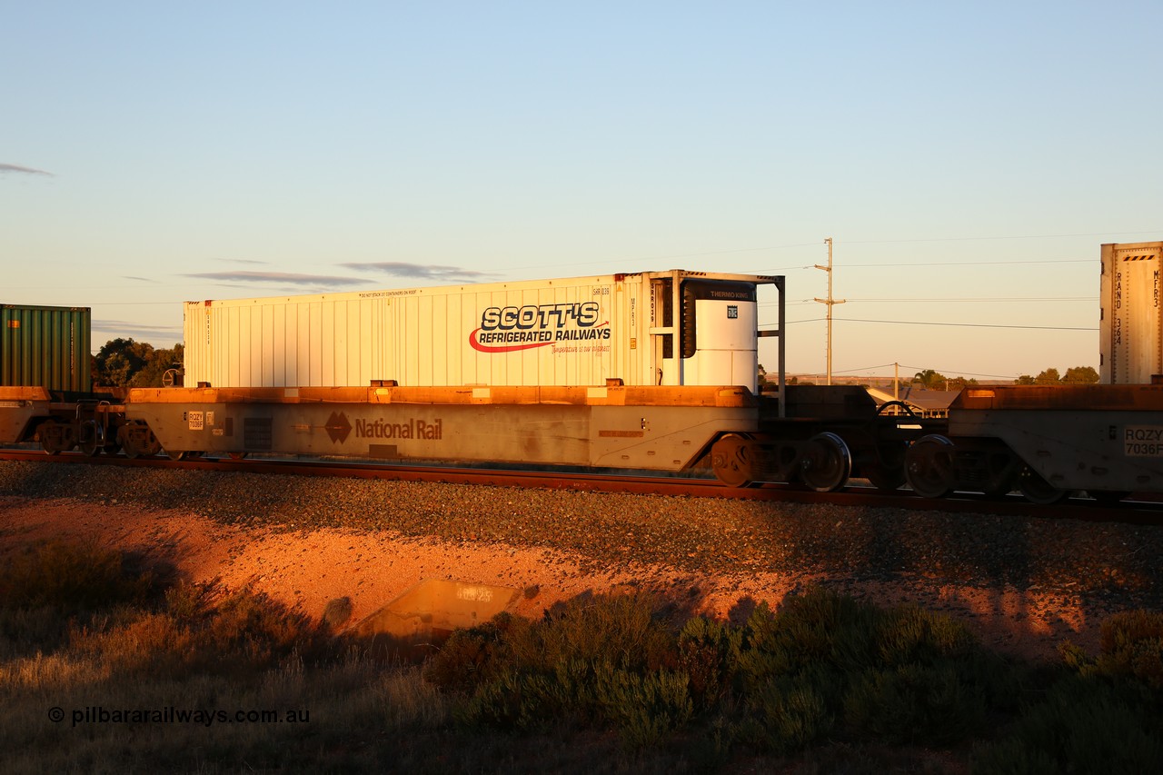 160601 10130
West Kalgoorlie, 2MP5 intermodal train, RQZY 7036 platform 1 of 5-pack well waggon set one of thirty two waggon sets built by Goninan NSW for National Rail in 1995-96, with an Scott's Refrigerated Railways 46' 6