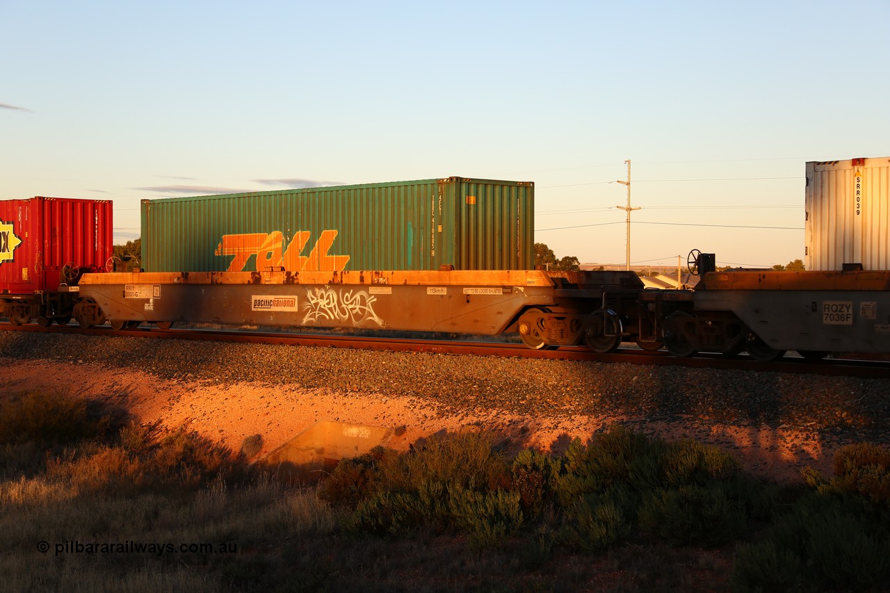 160601 10131
West Kalgoorlie, 2MP5 intermodal train, RRIY 0001 well waggon, a single well waggon rebuilt by Gemco WA from donor waggon five well set RQZY 7061 in 2006, makes a rear visit to WA with a Toll 40' 4FG1 type box TRRC 410605[4].
Keywords: RRIY-type;RRIY0001;Gemco-Rail-WA;RQZY-type;Goninan-NSW;