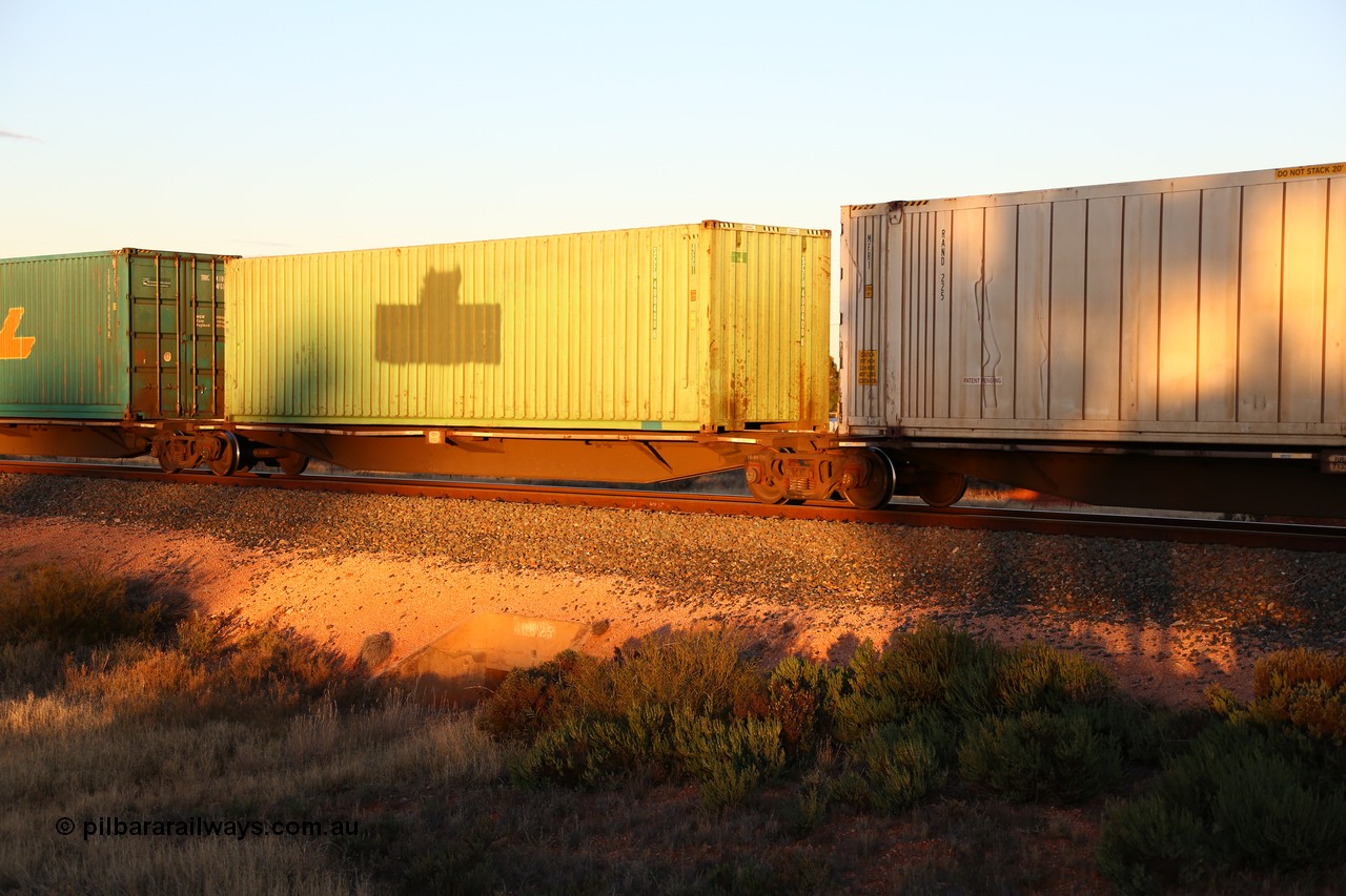 160601 10134
West Kalgoorlie, 2MP5 intermodal train, RRGY 7133 48' platform 3 of 5-pack articulated skel waggon, one of fifty built by AN Rail Islington Workshops in 1996-97 as type RRBY, later rebuilt with 48' intermediate decks and coded RRGY, 40' 4EG1 type green SCF box SCFU 400400[6] with a logo painted out.
Keywords: RRGY-type;RRGY7133;AN-Islington-WS;RRBY-type;