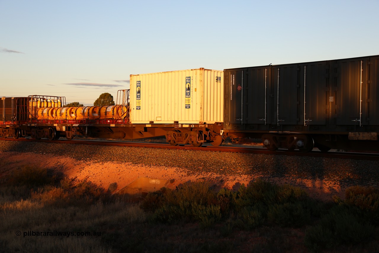 160601 10138
West Kalgoorlie, 2MP5 intermodal train, NQKY 34693 container waggon, originally built by EPT NSW as an open waggon type CDY in a batch of two hundred in 1975/76, recoded to NOCY. 20' Royal Wolf box RWTU 964775 and a KT type 40' flatrack KT 400273 loaded with IOXM chlorine gas cylinders.
Keywords: NQKY-type;NQKY34693;EPT-NSW;CDY-type;NOCY-type;