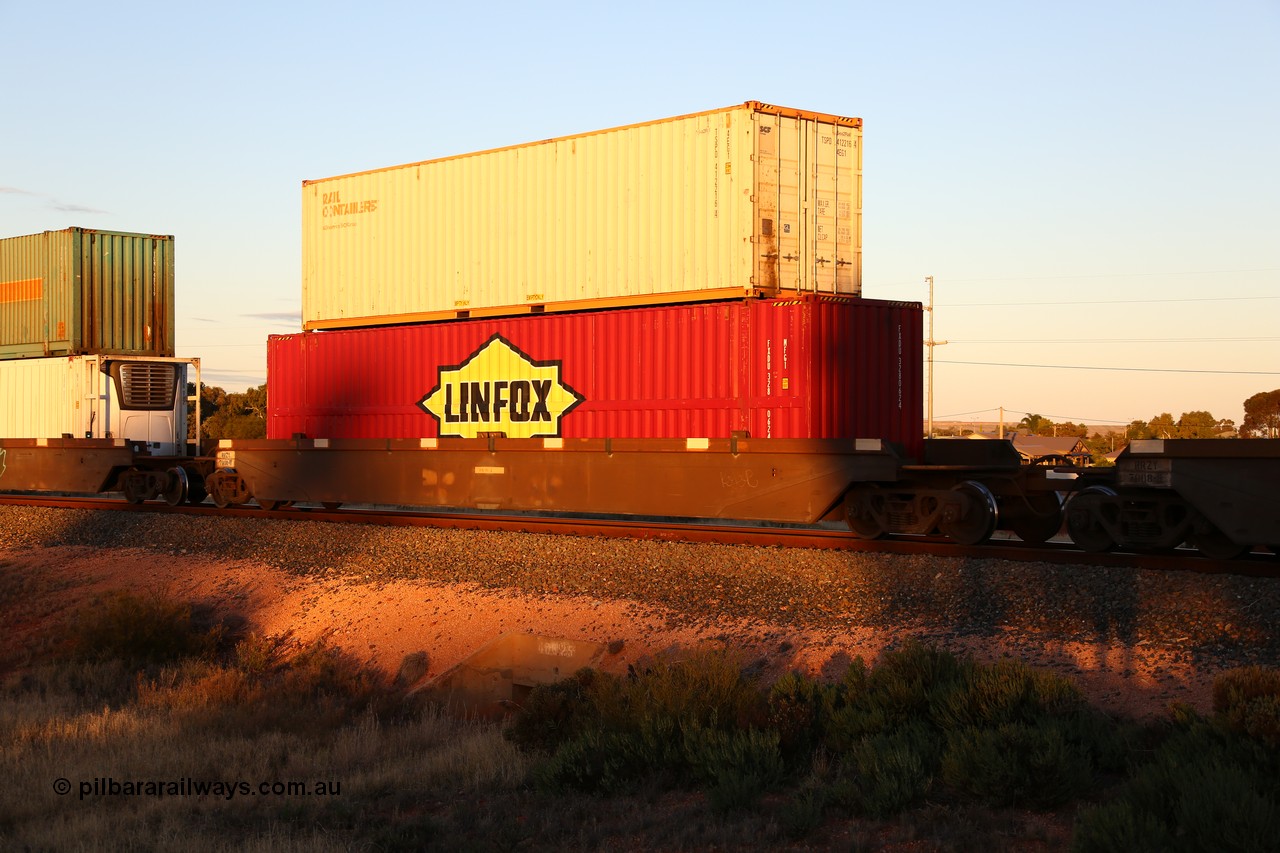 160601 10148
West Kalgoorlie, 2MP5 intermodal train, RRZY 7008 platform 4 of 5-pack well waggon set, the prototype of the RQZY type, first of twenty six sets built by Goninan in 1995-96 for National Rail, later rebuilt and recoded RRZY with a 48' Linfox MFG1 type box FXDU 3280624 and a 40' SCF Rail Containers 4EG1 type box TSPD 412216[4].
Keywords: RRZY-type;RRZY7008;Goninan-NSW;RQZY-type;