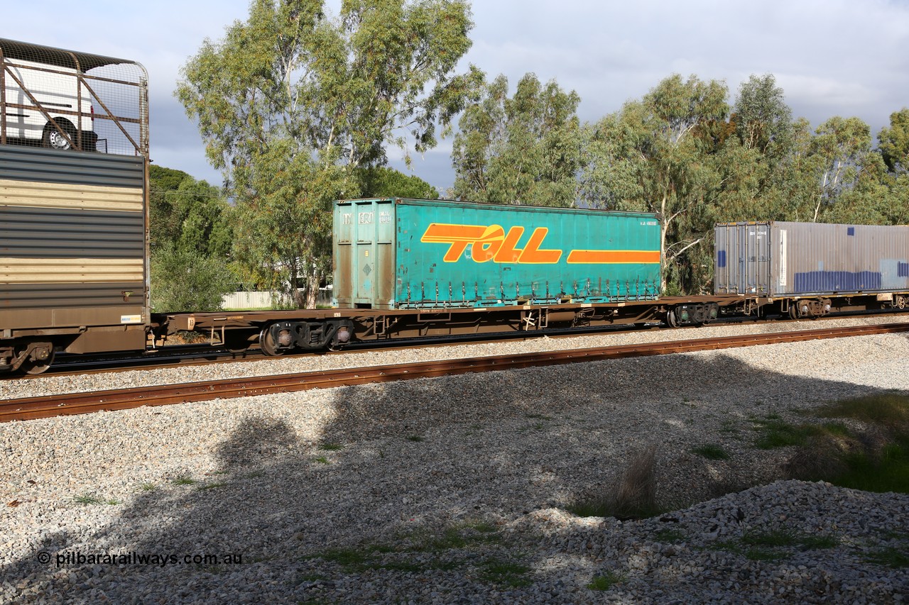 160609 0400
Woodbridge, 5PM5 intermodal train, RQPW 60068, originally built by V/Line Bendigo Workshops in April 1984 as VQDW 48 in a batch of fifty VQDW jumbo container waggons, leased to NSW and recoded and numbered as NQMW 60068, then to National Rail as RQPW. Loaded with Toll 40' curtainsider MLJL 4960965, a former Interlink container.
Keywords: RQPW-type;RQPW60068;V/Line-Bendigo-WS;VQDW-type;VQDW48;NQMW-type;