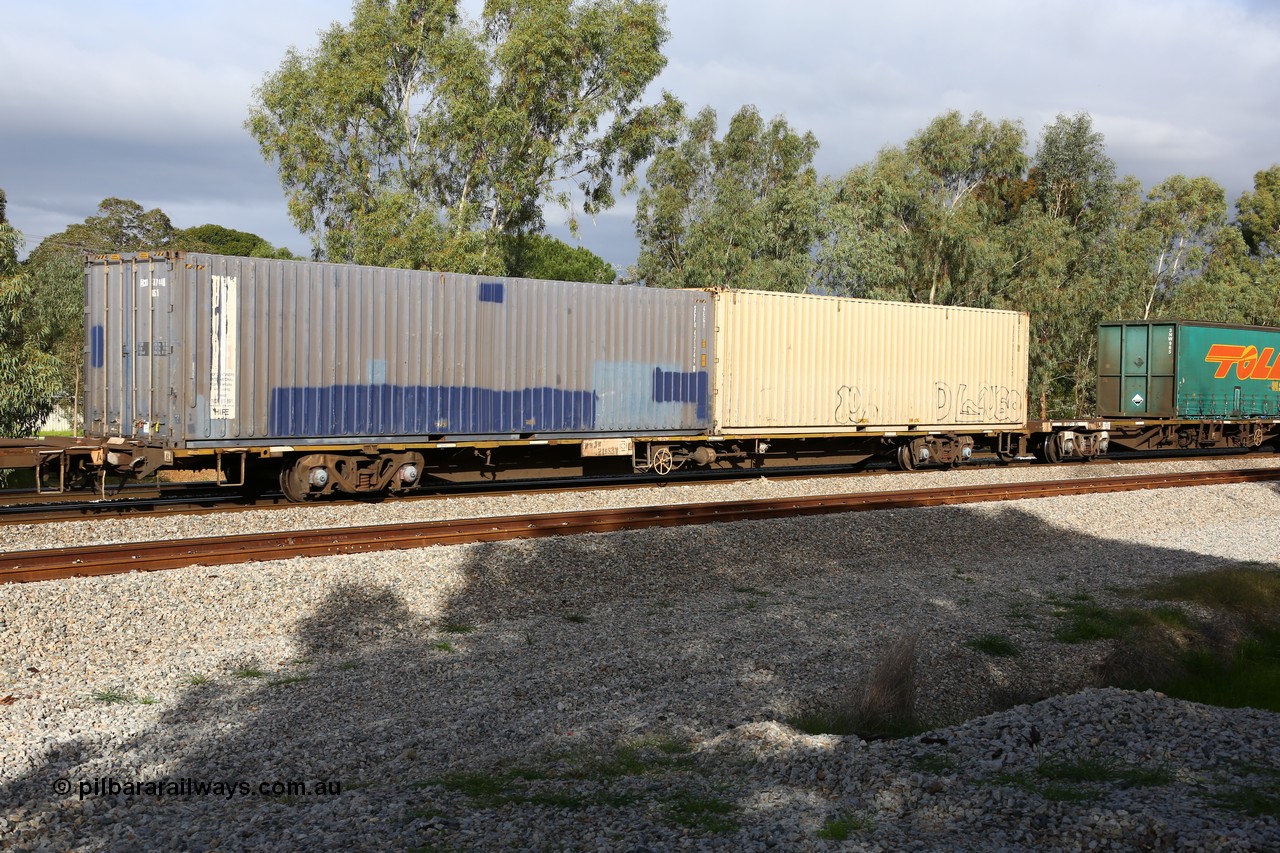 160609 0401
Woodbridge, 5PM5 intermodal train, RQJW 21983, originally built by Mittagong Engineering NSW in 1980 in a batch of twenty five JCW 80' jumbo container waggons. Recoded to NQJW then to National Rail as RQJW in 1994. Loaded with two 40' boxes, SCFU 471744[0] and Austrans AUCU 412415[7].
Keywords: RQJW-type;RQJW21983;Mittagong-Engineering-NSW;JCW-type;NQJW-type;