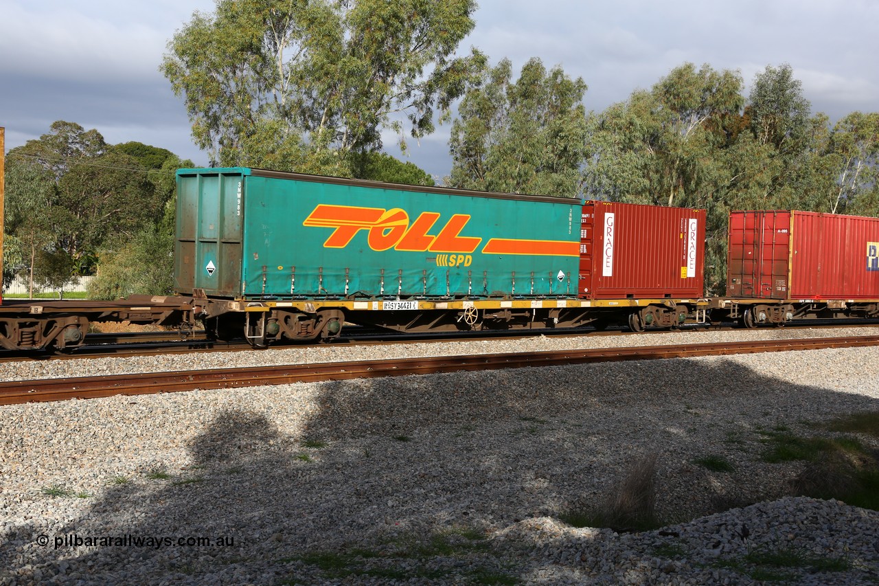 160609 0405
Woodbridge, 5PM5 intermodal train, RQSY 34421 built by Tulloch Ltd NSW as an OCY type container waggon in a batch of one hundred in 1974-75, recoded to NQOY, NQGY and RQGY. Toll 40' curtainsider 3NW 983 and a Grace 20' 2EG1 type box GRRU 230691[1].
Keywords: RQSY-type;RQSY34421;Tulloch-Ltd-NSW;OCY-type;