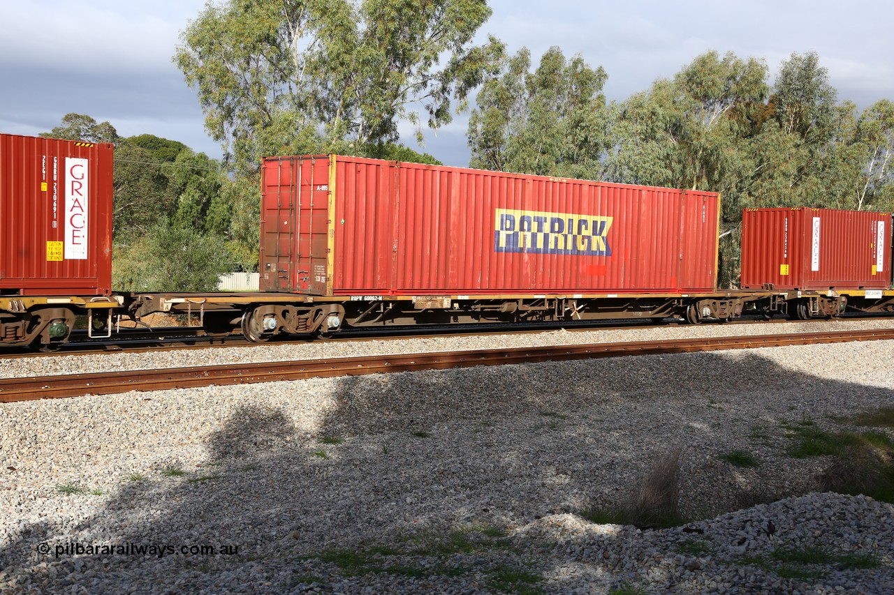 160609 0406
Woodbridge, 5PM5 intermodal train, RQPW 60062, originally built by V/Line Bendigo Workshops in April 1984 as VQDW 41 in a batch of fifty VQDW jumbo container waggons, leased to NSW and recoded and numbered as NQMW 60062, then to National Rail as RQPW. Loaded with Patrick 53' automobile box A 095.
Keywords: RQPW-type;RQPW60062;V/Line-Bendigo-WS;VQDW-type;VQDW41;NQMW-type;