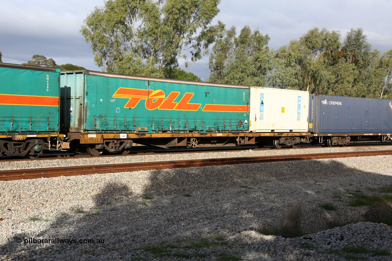 160609 0409
Woodbridge, 5PM5 intermodal train, VQCY 886, built by the Victorian Railways Bendigo Workshops in 1976 in a batch of one hundred FQX type container waggons. Recoded to VQCX in 1980. Toll 40' curtainsider NW 4850 and Royal Wolf 20' 25G1 box RWPU 200850[5].
Keywords: VQCY-type;VQCY886;Victorian-Railways-Bendigo-WS;FQX-type;VQCX-type;