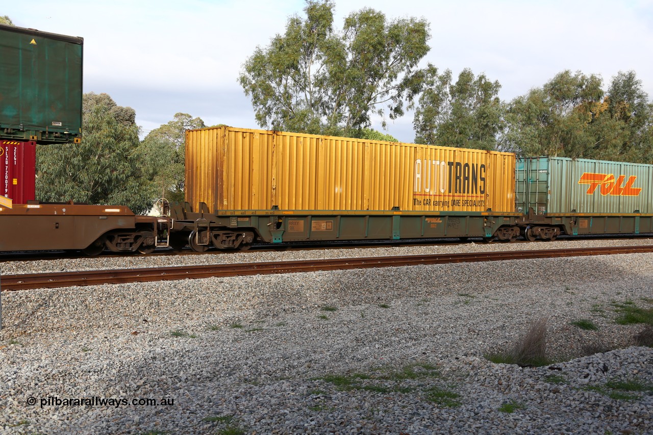 160609 0421
Woodbridge, 5PM5 intermodal train, RRXY 9 platform 5 of 5-pack well waggon set, one of eleven built by Bradken Qld in 2002 for Toll from a Williams-Worley design with a 53' AutoTrans automobile box AB 035.
Keywords: RRXY-type;RRXY9;Williams-Worley;Bradken-Rail-Qld;