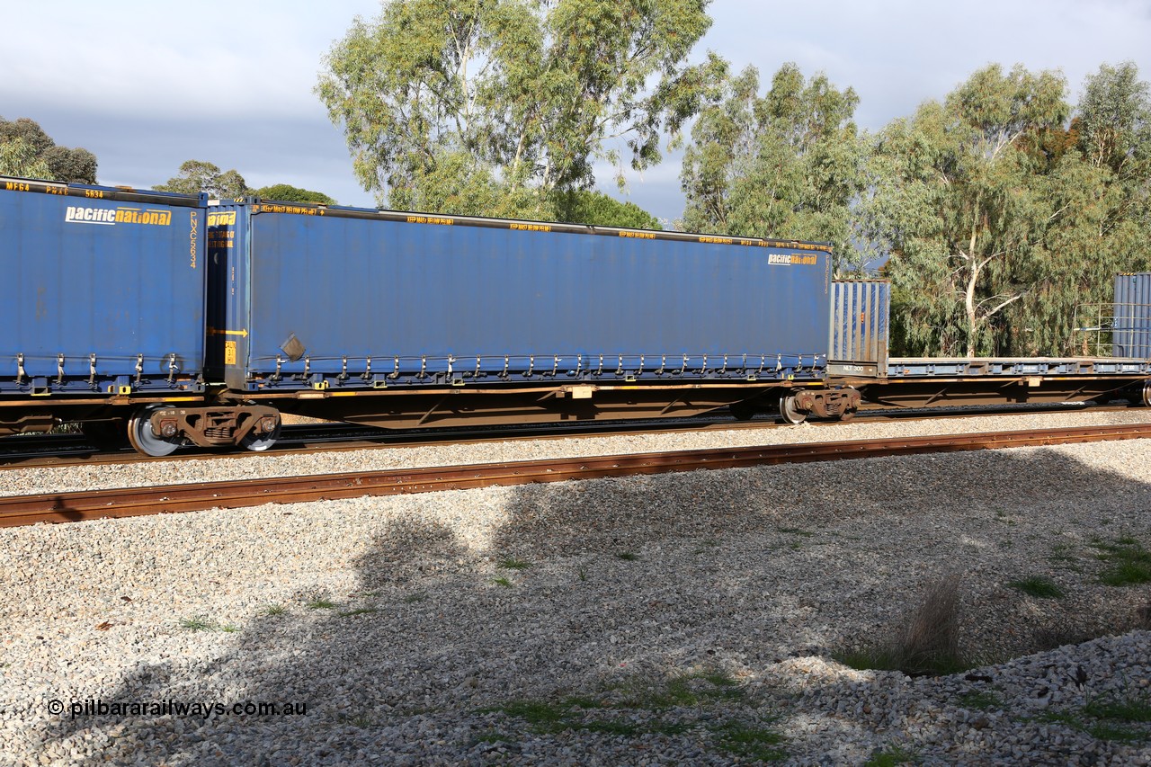 160609 0435
Woodbridge, 5PM5 intermodal train, RRAY 7179 platform 3 of 5-pack articulated skel waggon set, one of 100 built by ABB Engineering NSW 1996-2000, with a Pacific National 48' MFG4 type curtainsider PNXC 5616.
Keywords: RRAY-type;RRAY7179;ABB-Engineering-NSW;