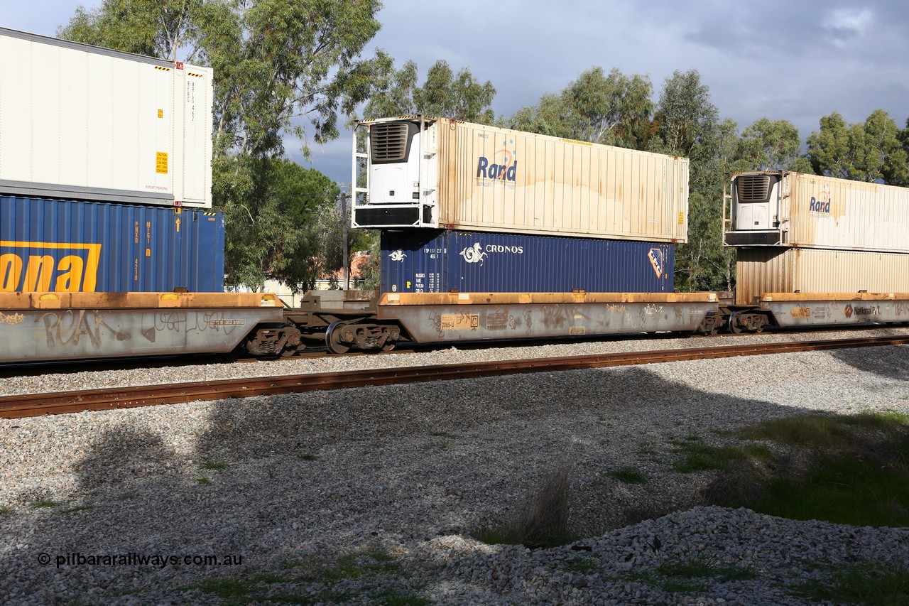 160609 0442
Woodbridge, 5PM5 intermodal train, RQZY 7065 platform 4 of 5-pack well waggon set one of thirty two waggon sets built by Goninan NSW for National Rail in 1995-96, double stacked with a Rand Refrigerated Logistics 46' 6