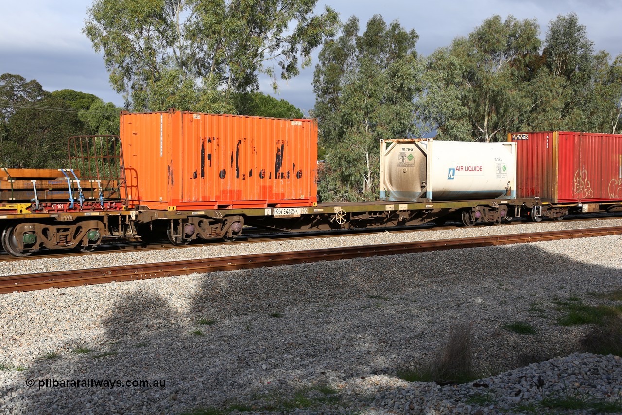 160609 0456
Woodbridge, 5PM5 intermodal train, RQGY 34425 container waggon built by Tulloch Ltd NSW in 1974/75 as type OCY, then NQOY. FCL 20' orange box FCBU 963215 and an Air Liquide 20' tanktainer IS 16-8.
Keywords: RQGY-type;RQGY34425;Tulloch-Ltd-NSW;OCY-type;NQOY-type;