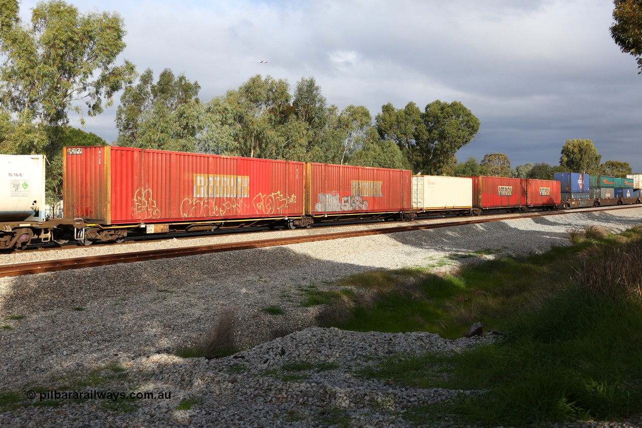 160609 0457
Woodbridge, 5PM5 intermodal train, RRYY 22, 5-pack articulated low profile skel waggon set, one of fifty two such sets built by Bradken Rail Braemar NSW from a Williams-Worley design, based on the TNT TRAY type for moving automotive carrying containers, with four Patrick 53' automotive containers and a 40' box on platform 3.
Keywords: RRYY-type;RRYY22;Williams-Worley;Bradken-NSW;