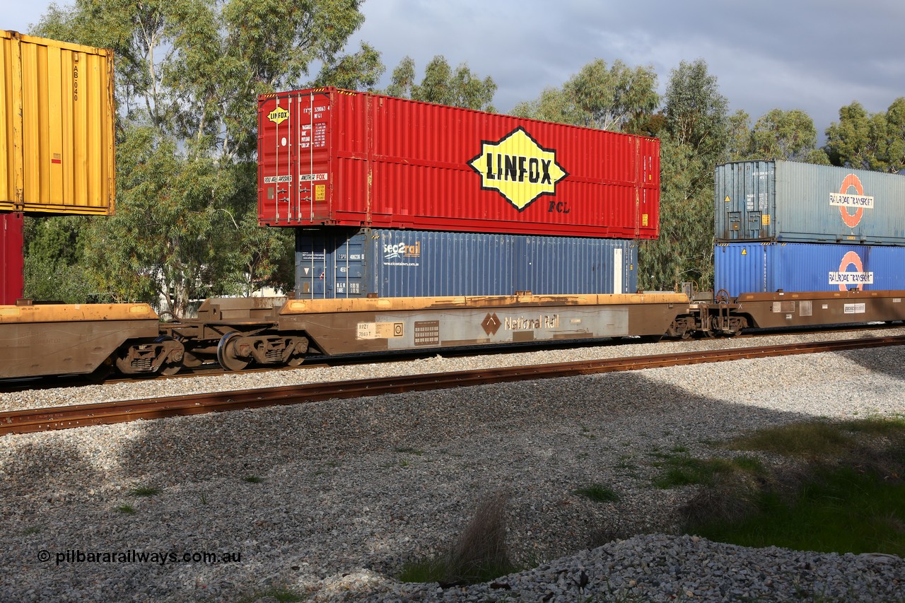 160609 0474
Woodbridge, 5PM5 intermodal train, RRZY 7049 platform 1 of 5-pack well waggon set, one of thirty two sets built by Goninan NSW in 1995-96 for National Rail as RQZY type, recoded to RRZY when repaired with a sea2rail 40' 4EG1 type box TSPD 408236[0] and Linfox - FCL 48' MFG1 type container FXDU 328063[4].
Keywords: RRZY-type;RRZY7049;Goninan-NSW;RQZY-type;
