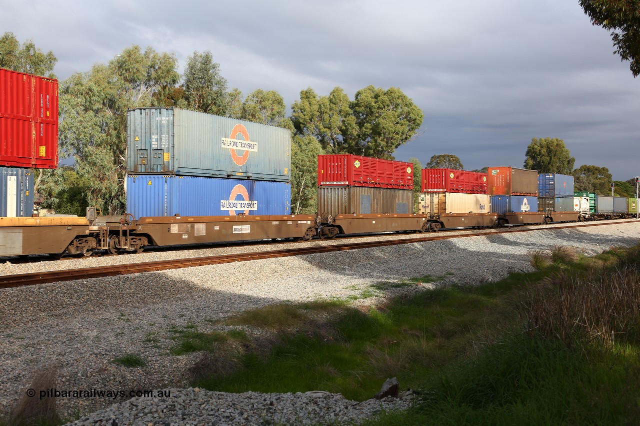 160609 0475
Woodbridge, 5PM5 intermodal train, 5-pack RRRY 7012 well waggon set, one of nineteen built in China at Zhuzhou Rolling Stock Works for Goninan in 2005 with a variety of 40' containers and a 46' 6