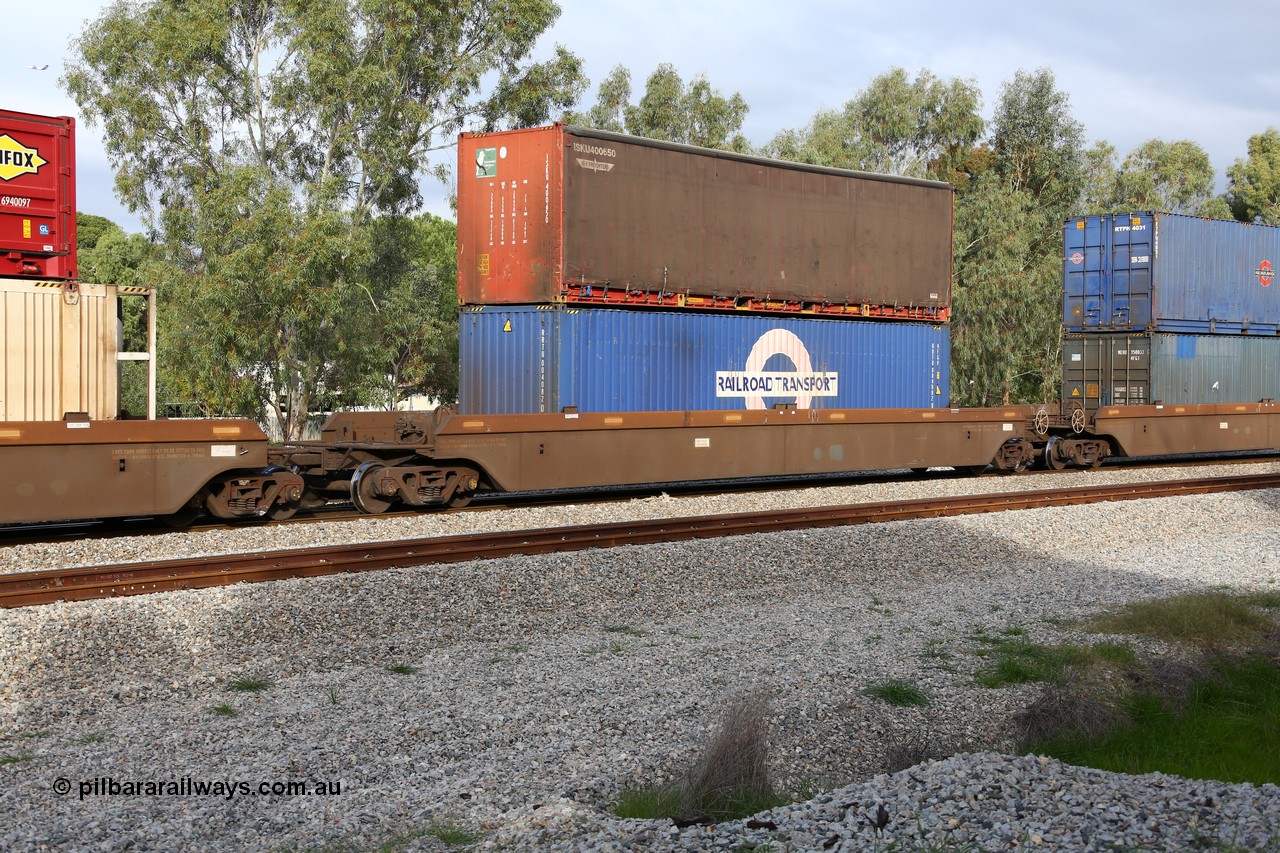 160609 0479
Woodbridge, 5PM5 intermodal train, platform 2 of 5-pack RRRY 7012 well waggon set, one of nineteen built in China at Zhuzhou Rolling Stock Works for Goninan in 2005, double stacked with a K+S Freighters 40' curtainsider ISKU 400650 and a 40' 4FG9 type Railroad Transport box RRTU 004082[0].
Keywords: RRRY-type;RRRY7012;CSR-Zhuzhou-Rolling-Stock-Works-China;