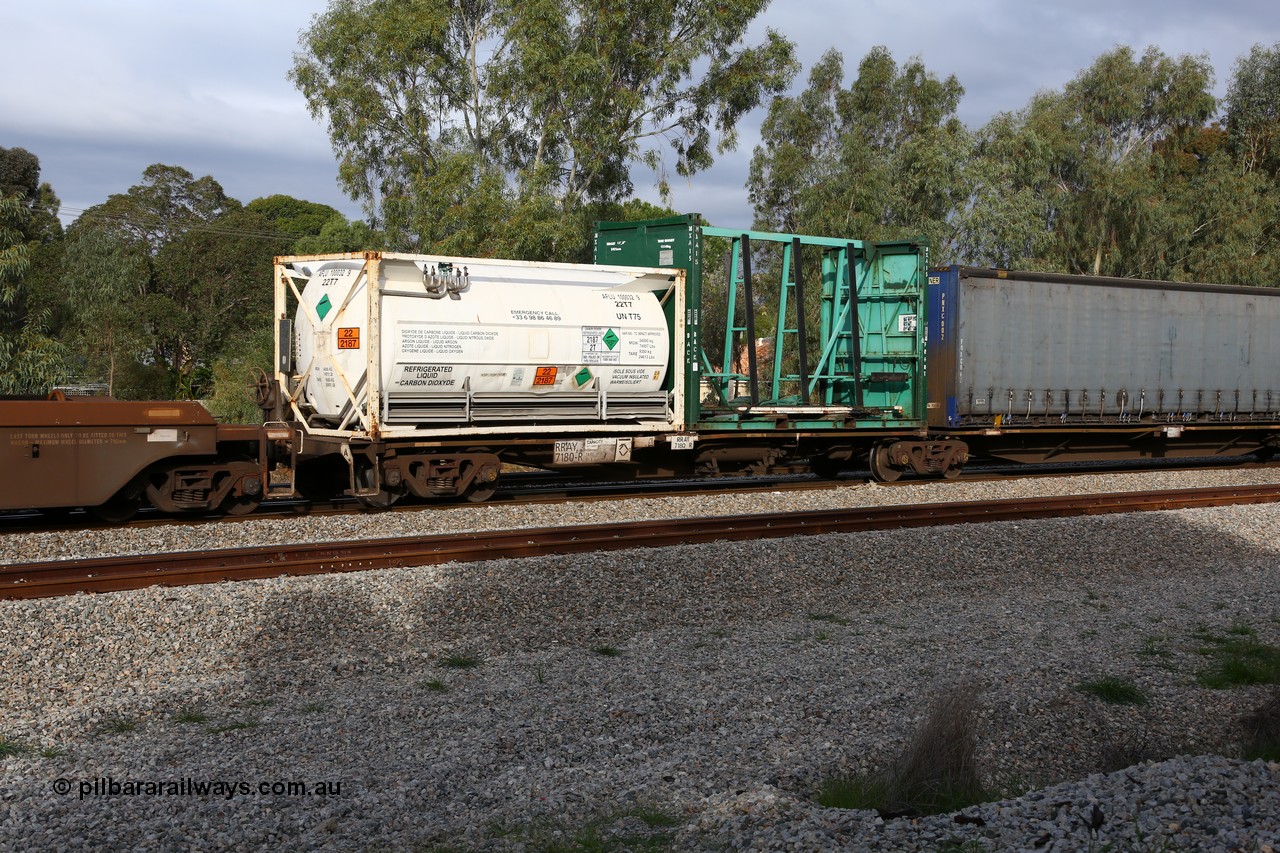 160609 0481
Woodbridge, 5PM5 intermodal train, RRAY 7180 platform 1 of 5-pack articulated skel waggon set, one of a hundred built by ABB Engineering NSW 1996-2000, 40' deck with a 20' Air Liquide 22T7 type ISO tainer AFLU 100032[9] and a 20' empty glass grate MXA 15.
Keywords: RRAY-type;RRAY7180;ABB-Engineering-NSW;