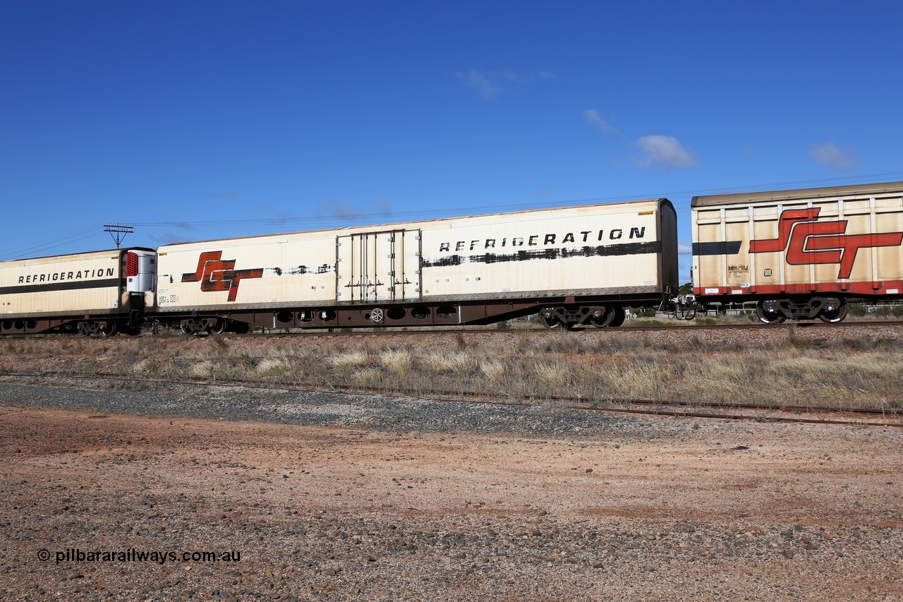 160522 2259
Parkeston, SCT train 6MP9 operating from Melbourne to Perth, ARFY type ARFY 2228 refrigerated van with a Ballarat built Maxi-CUBE body mounted on an original Commonwealth Railways ROX container waggon built by Comeng Victoria in 1970, recoded to AFQX, AQOY and RQOY before having the Maxi-CUBE refrigerated body added circa 1998 for SCT service.
Keywords: ARFY-type;ARFY2228;Maxi-Cube;Comeng-Vic;ROX-type;AQOX-type;