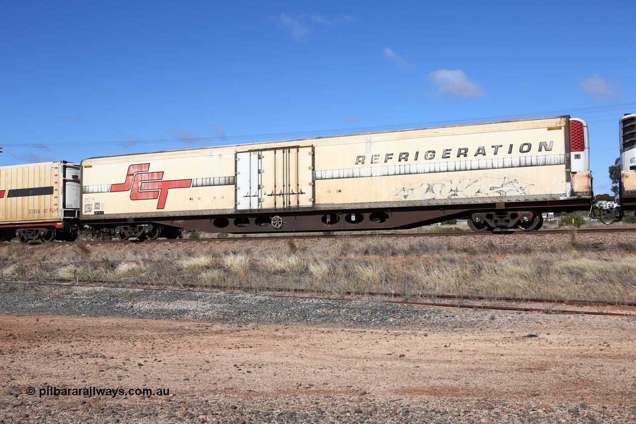 160522 2262
Parkeston, SCT train 6MP9 operating from Melbourne to Perth, ARFY type ARFY 2188 refrigerated van with a Ballarat built Maxi-CUBE body mounted on an original Commonwealth Railways ROX container waggon built by Comeng Qld in 1970, recoded to AQOX, AQOY and RQOY before having the Maxi-CUBE refrigerated body added circa 1998 for SCT service.
Keywords: ARFY-type;ARFY2188;Maxi-Cube;Comeng-Qld;ROX-type;AQOX-type;
