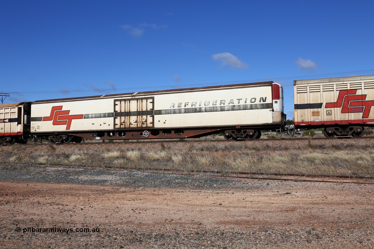160522 2273
Parkeston, SCT train 6MP9 operating from Melbourne to Perth, ARFY type ARFY 2181 refrigerated van with New Zealand built Fairfax body mounted on an original Commonwealth Railways ROX container waggon built by Comeng Quds in 1970, recoded to AFQX, then AQOX and RQOY before being fitted with the refrigerated body for SCT service circa 1998. 
Keywords: ARFY-type;ARFY2181;Fairfax-NZL;Comeng-Qld;ROX-type;AQOX-type;