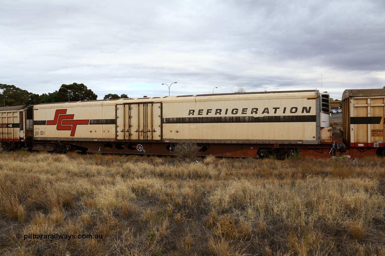 160524 3698
Kalgoorlie, SCT train 2PM9 operating from Perth to Melbourne, ARFY type ARFY 2198 refrigerated van with a Ballarat built Maxi-CUBE body mounted on an original Commonwealth Railways ROX container waggon built by Comeng Qld in 1970, recoded to AQOX, AQOY and RQOY before having the Maxi-CUBE refrigerated body added circa 1998 for SCT service.
Keywords: ARFY-type;ARFY2198;Maxi-Cube;Comeng-Qld;ROX-type;AQOX-type;