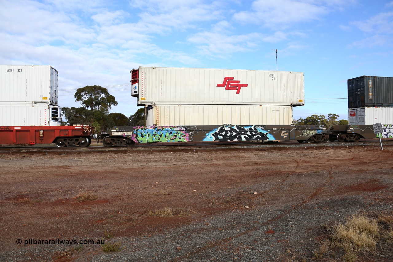 160525 4572
Parkeston, SCT train 3PG1 which operates from Perth to Parkes NSW (Goobang Junction), CFCLA lease CQWY type well waggon set CQWY 5038-2 with a former Macfield 40' reefer MGCU 681005 and a 48' SCT reefer SCTR 210. The CQWY was built by Bluebird Rail Operations in South Australia in 2008 as a batch of sixty pairs.
Keywords: CQWY-type;CQWY5038;CFCLA;Bluebird-Rail-Operations-SA;