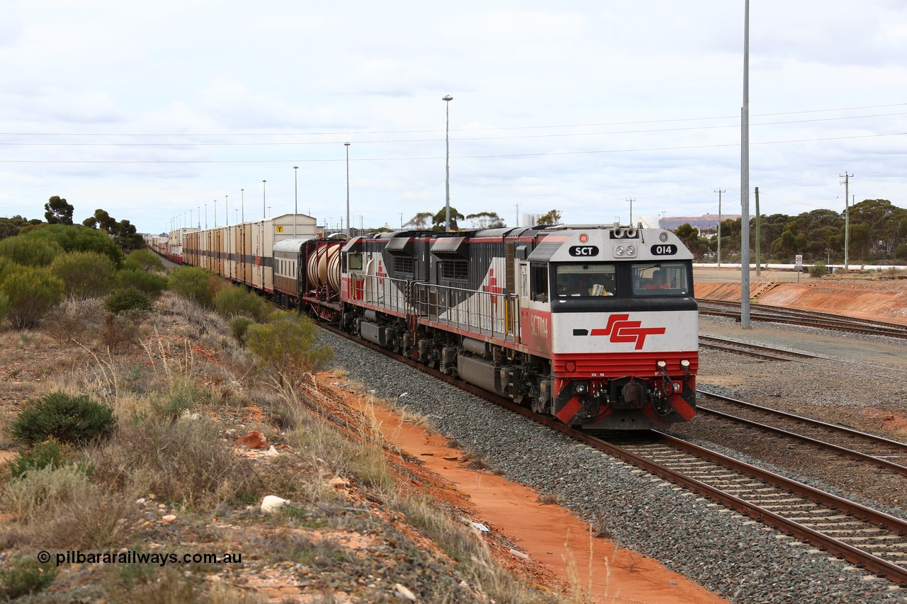 160526 5278
West Kalgoorlie, SCT train 3MP9 operating from Melbourne to Perth, with 76 waggons for 5709.8 tonnes and 1795 metres with EDI Downer built EMD model GT46C-ACe unit SCT 014 serial 08-1738 on the point with sister unit SCT 012 as they hold the mainline in West Kalgoorlie waiting for the Prospector railcar to cross.
Keywords: SCT-class;SCT014;EDI-Downer;EMD;GT46C-ACe;08-1738;