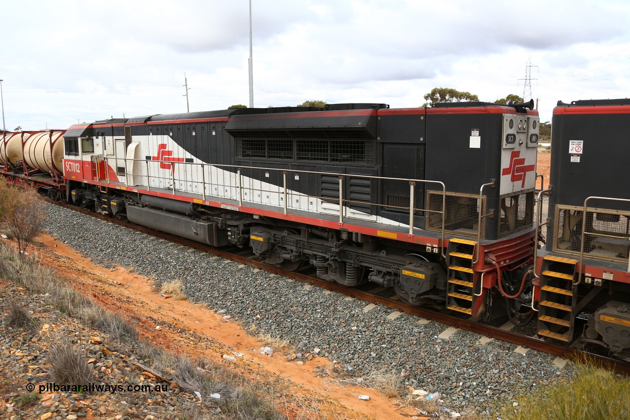 160526 5279
West Kalgoorlie, SCT train 3MP9 operating from Melbourne to Perth, with 76 waggons for 5709.8 tonnes and 1795 metres with EDI Downer built EMD model GT46C-ACe unit SCT 012 serial 08-1736 as second unit to sister unit SCT 014 as they hold the mainline in West Kalgoorlie waiting for the Prospector railcar to cross.
Keywords: SCT-class;SCT012;EDI-Downer;EMD;GT46C-ACe;08-1736;