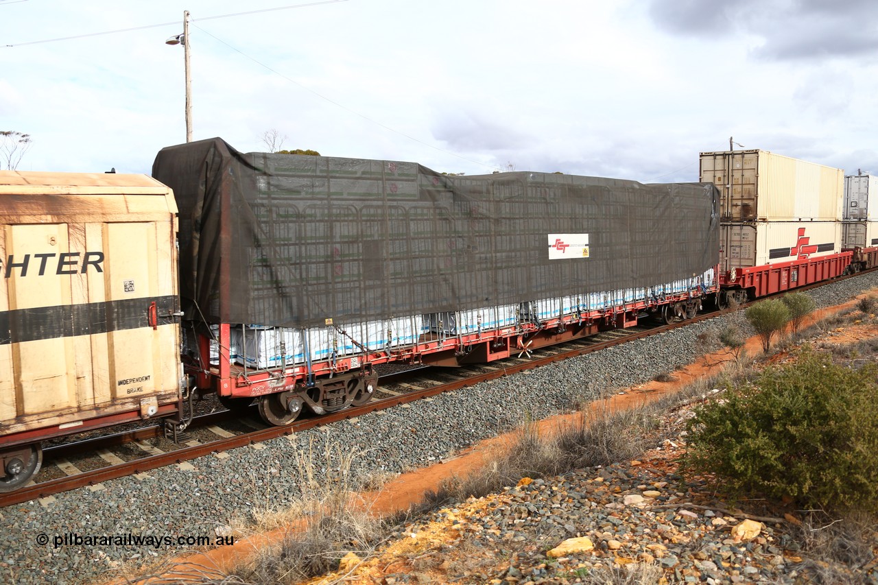 160526 5334
West Kalgoorlie, SCT train 3MP9 operating from Melbourne to Perth, originally built by Victorian Railways Newport Workshops in 1969 as one of four hundred and fifty five FQX type 60' 3TEU container flat waggons built over ten years, it managed to be recoded several times carrying FQF - VQCX - VQCY - VQCX - RQCX before private ownership and reclassed PQCY type, PQCY 564 is now fitted with bulkheads and here loaded with timber products.
Keywords: PQCY-type;PQCY564;Victorian-Railways-Newport-WS;FQX-type;VQCX-type;