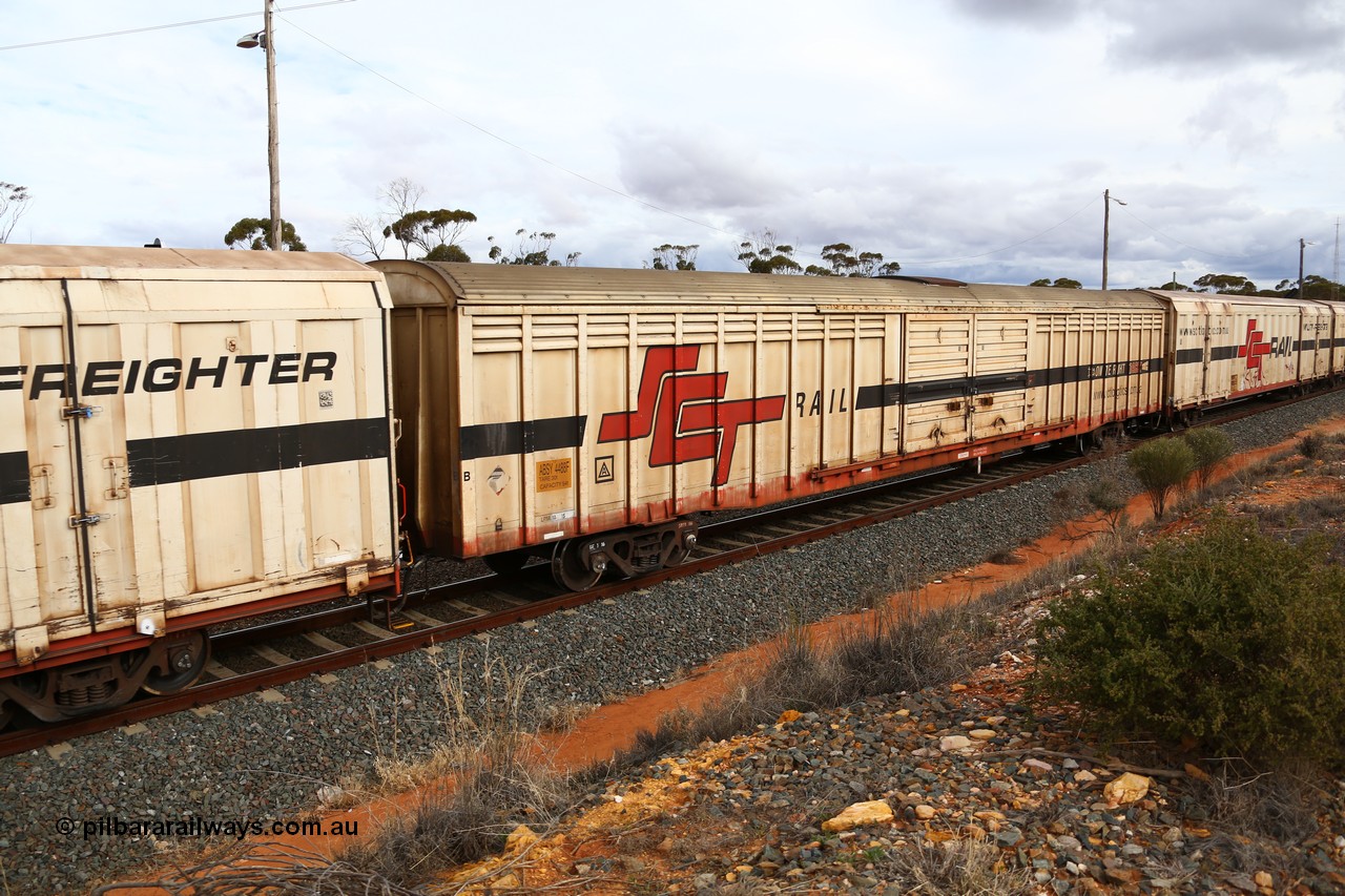 160526 5352
West Kalgoorlie, SCT train 3MP9 operating from Melbourne to Perth, ABSY type van ABSY 4488, one of a batch of fifty made by Comeng WA as VFX type 75' covered vans 1977, recoded to ABFX type, when Gemco WA upgraded it to ABSY type, seen here with the silver corrugated roof fitted and the centre loading roof hatch.
Keywords: ABSY-type;ABSY4488;Comeng-WA;VFX-type;ABFX-type;