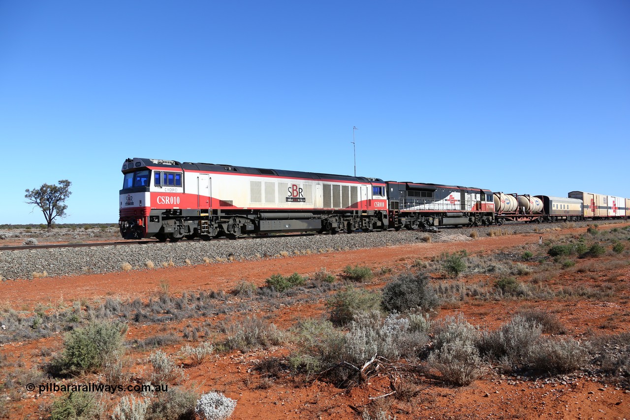 160527 5523
Blamey crossing loop at the 1692 km, SCT train 5PM9 operating from Perth to Melbourne speeds through behind CSR Ziyang Locomotive Co, China SDA1 model SCT CSR class locomotive CSR 010 'C Mobrici' and SCT 008 with 71 waggons for 4117.5 tonnes and 1752.5 metres.
Keywords: CSR-class;CSR-010;CSR-Ziyang-China;SDA1;