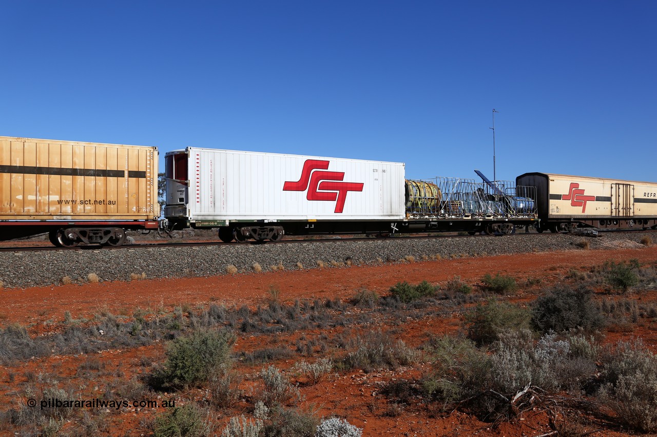 160527 5549
Blamey crossing loop at the 1692 km, SCT train 5PM9 operating from Perth to Melbourne, originally built by V/Line's Bendigo Workshops in June 1986 as one of fifty VQDW type 'Jumbo' Container Flat waggons built, PQDY 56 still in Freight Australia green livery loaded with an SCT 40' reefer SCTR 146 and a former Macfield 40' flatrack MGCU loaded with underground vent fans.
Keywords: PQDY-type;PQDY56;Victorian-Railways-Bendigo-WS;VQDW-type;