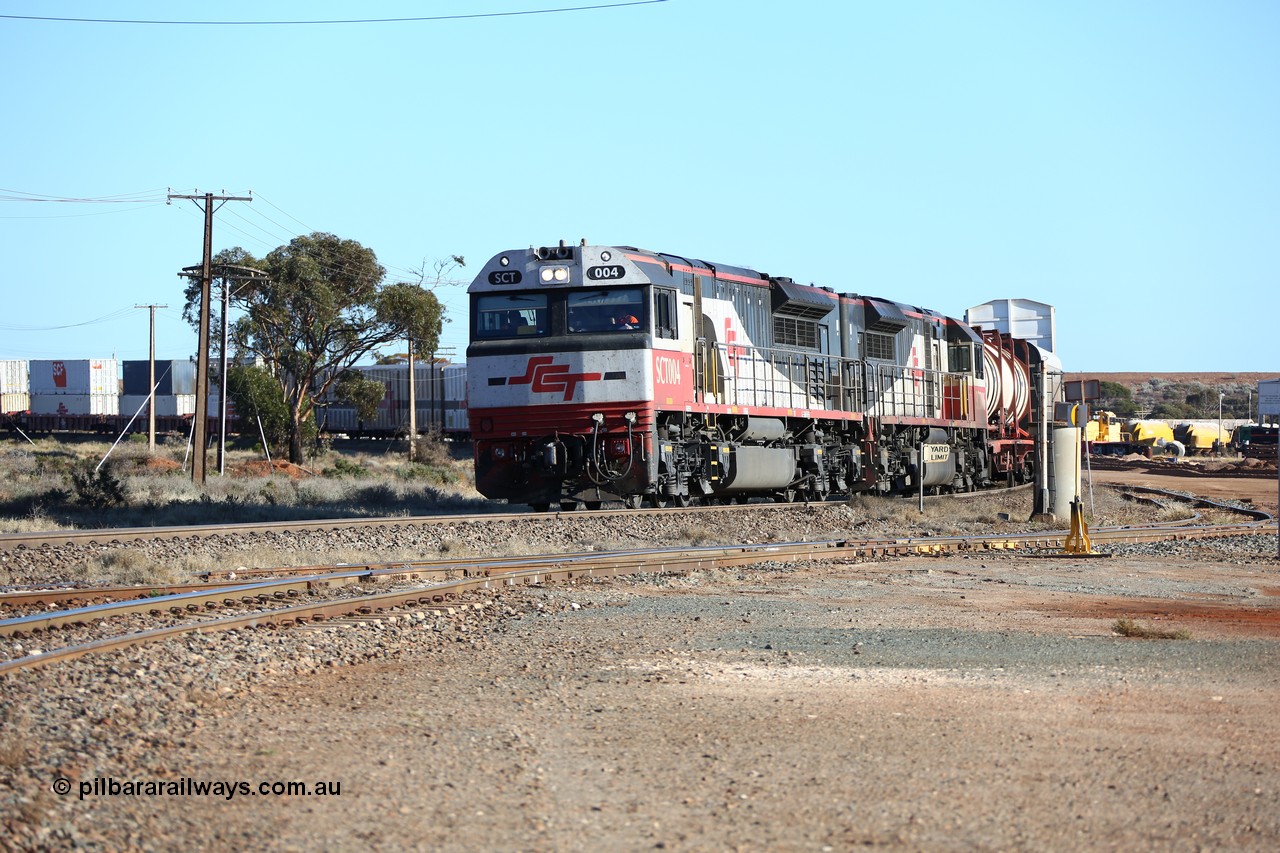 160530 9085
Parkeston, SCT train 1PM9 operates mostly empty from Perth to Melbourne, seen here arriving to take the loop behind EDI Downer built EMD model GT46C-ACe unit SCT 004 serial 97-1728 and SCT 006 with 66 waggons for 2479 tonnes and 1603 metres length, the former AN Parkeston yard can be seen to the right, now used by Cockburn Lime.
Keywords: SCT-class;SCT004;EDI-Downer;EMD;GT46C-ACe;07-1728;