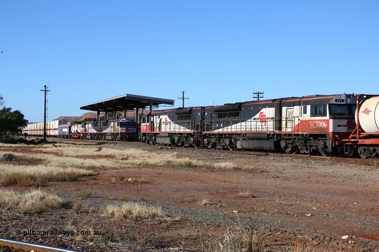 160530 9096
Parkeston, return SCT working 1PM9 led by SCT 004 crosses opposing SCT Perth bound train 7GP1 with SCT 013 on the lead waiting on the mainline. Before SCT introduced these AC traction locomotives the original operations were powered by three of four 3000 hp DC locomotives.
Keywords: SCT-class;SCT004;07-1728;EDI-Downer;EMD;GT46C-ACe;