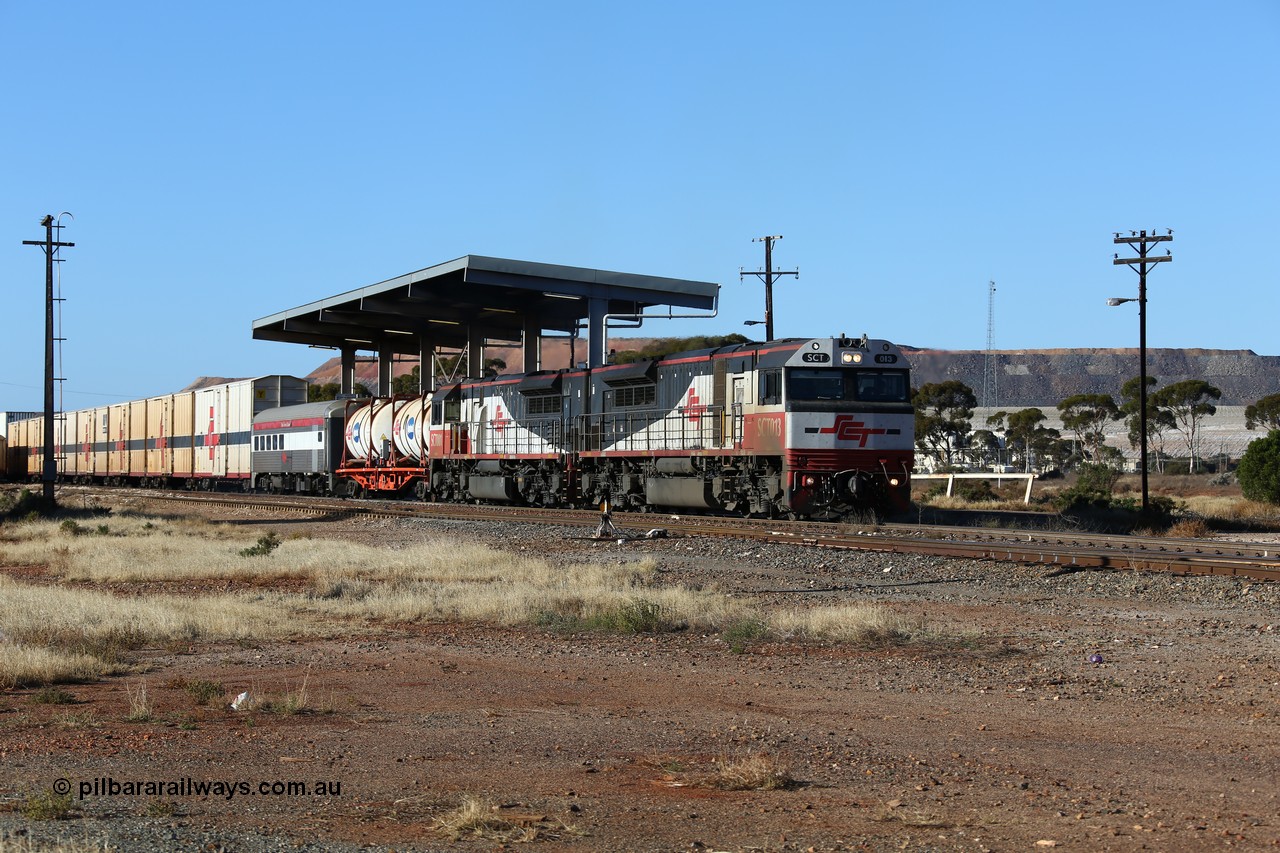 160530 9164
Parkeston, SCT train 7GP1 which operates from Parkes NSW (Goobang Junction) to Perth departs on the mainline behind SCT class SCT 013 serial 08-1737 an EDI Downer built EMD model GT46C-ACe and sister loco SCT 001 with 71 waggons for 5275 tonnes and 1679 metres.
Keywords: SCT-class;SCT013;EDI-Downer;EMD;GT46C-ACe;08-1737;