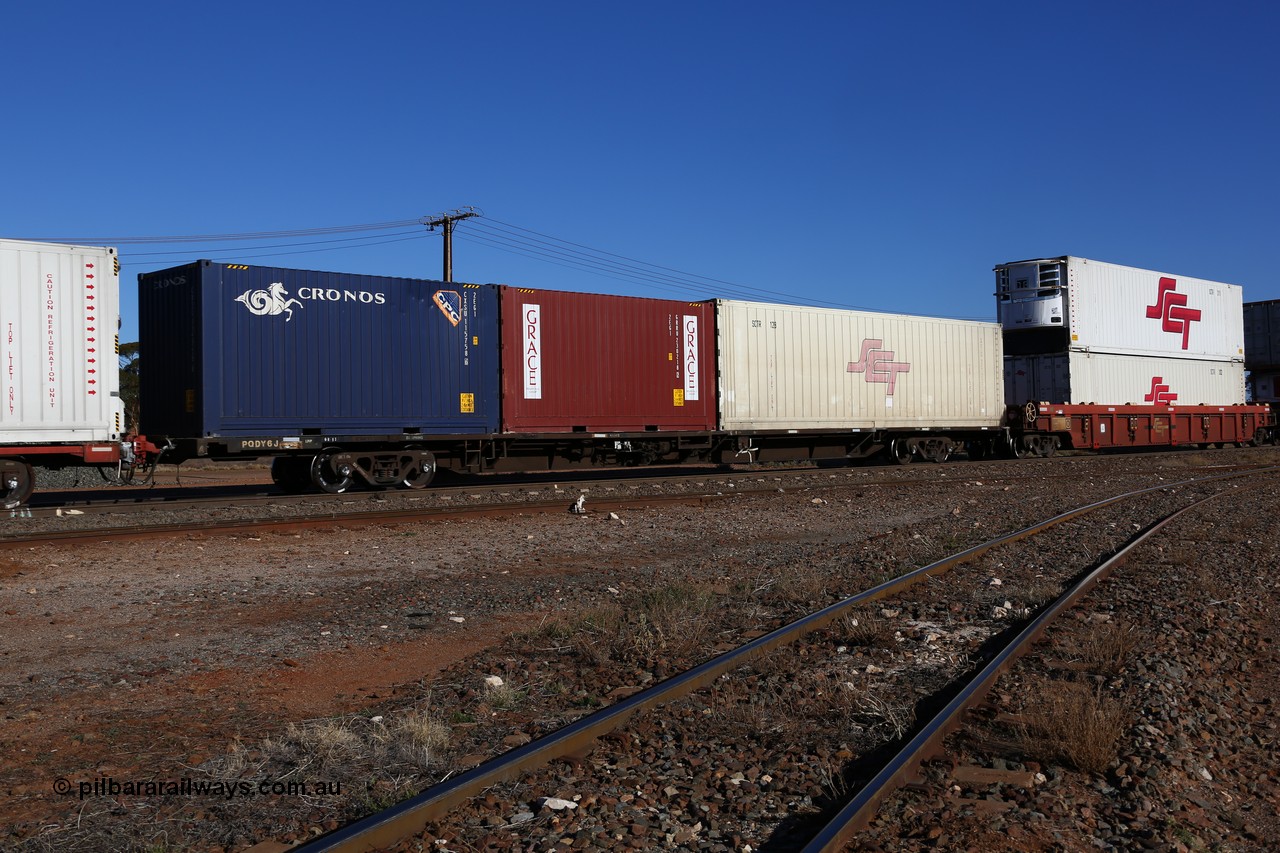 160530 9222
Parkeston, SCT train 7GP1 which operates from Parkes NSW (Goobang Junction) to Perth, originally built by Victorian Railways Newport Workshops in August 1975 as one of twenty five FCF type 'Jumbo' Container Flat waggons built, PQDY 6 still in Freight Australia green livery loaded with an SCT 40' reefer SCTR 128 and two 2EG1 type 20' boxes Grace GRRU 230218 and Cronos CXSU 115758.
Keywords: PQDY-type;PQDY6;Victorian-Railways-Newport-WS;FCF-type;FCW-type;VQDW-type;