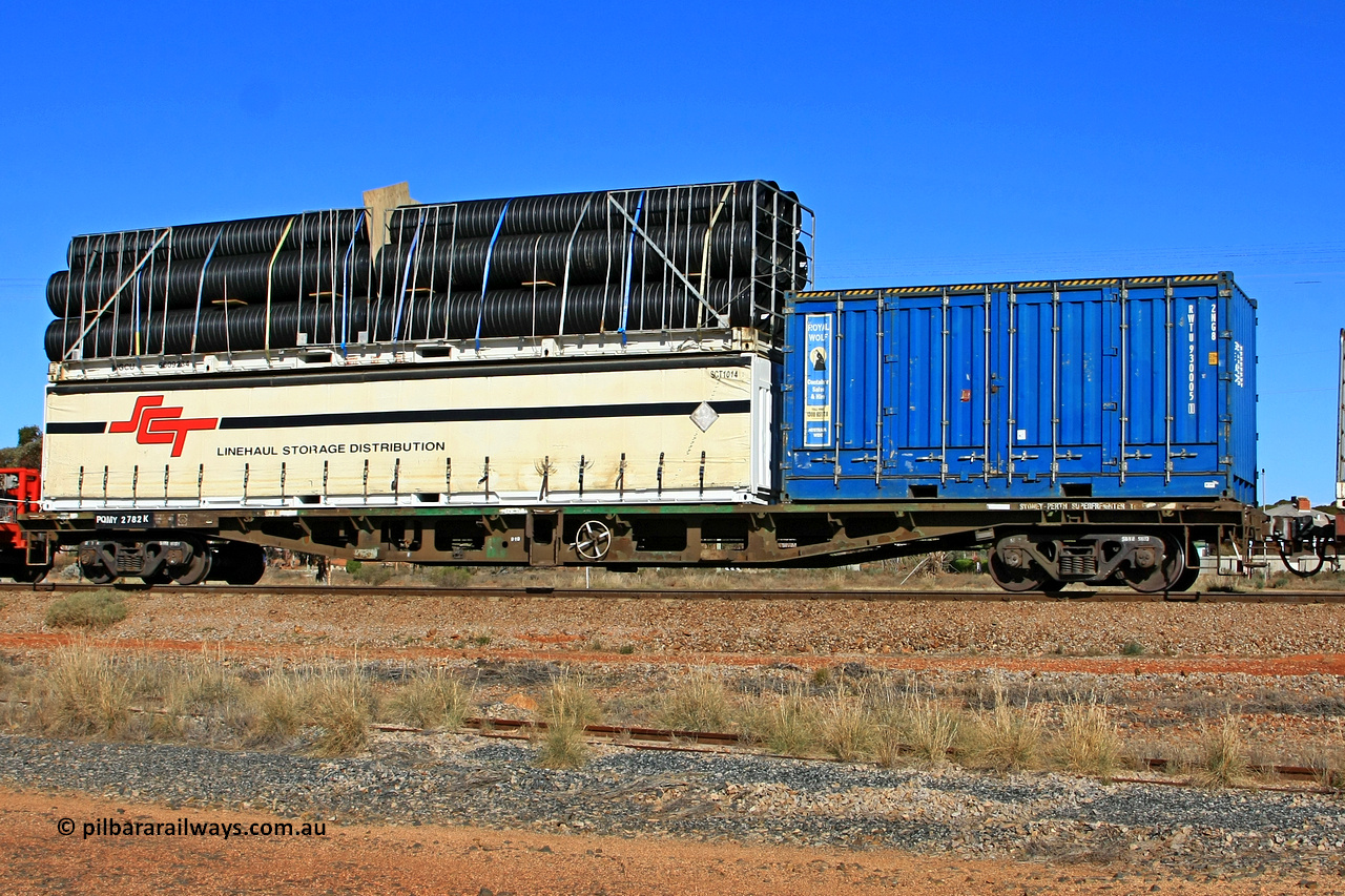 100603 8976
Parkeston, SCT train 3MP9, PQMY type container flat waggon PQMY 2782, built by Perry Engineering SA in 1974 as a batch of fifty five RMX type waggons, recoded through AQMX, AQSY and RQKY. Loaded with a Royal Wolf 20' 2NG8 type side door and a 40' flatrack MGCU 6609234 double stacked with an SCT 40' curtainsider SCT 1014.
Keywords: PQMY-type;PQMY2782;Perry-Engineering-SA;RMX-type;AQMX-type;AQMY-type;RQMY-type;