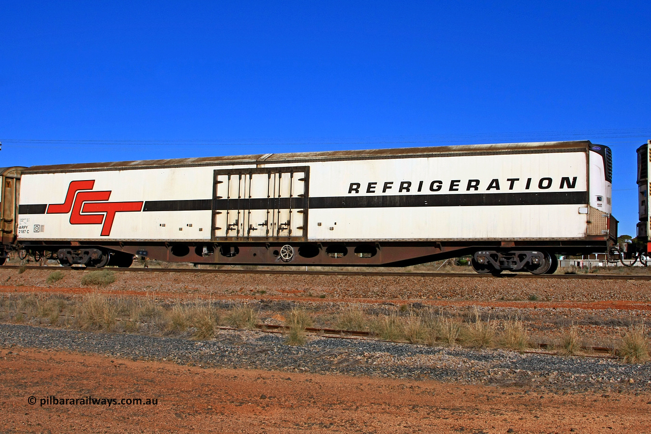 100603 9005
Parkeston, SCT train 3MP9, ARFY type ARFY 2187 refrigerated van with the original style short side doors Fairfax (NZL) built fibreglass body that has been fitted to a Comeng Qld 1970 built RO type flat waggon that was in service with Commonwealth Railways and recoded though ROX - AQOX - AQOY - RQOY codes before conversion.
Keywords: ARFY-type;ARFY2187;Fairfax-NZL;Comeng-Qld;RO-type;AQOX-type;