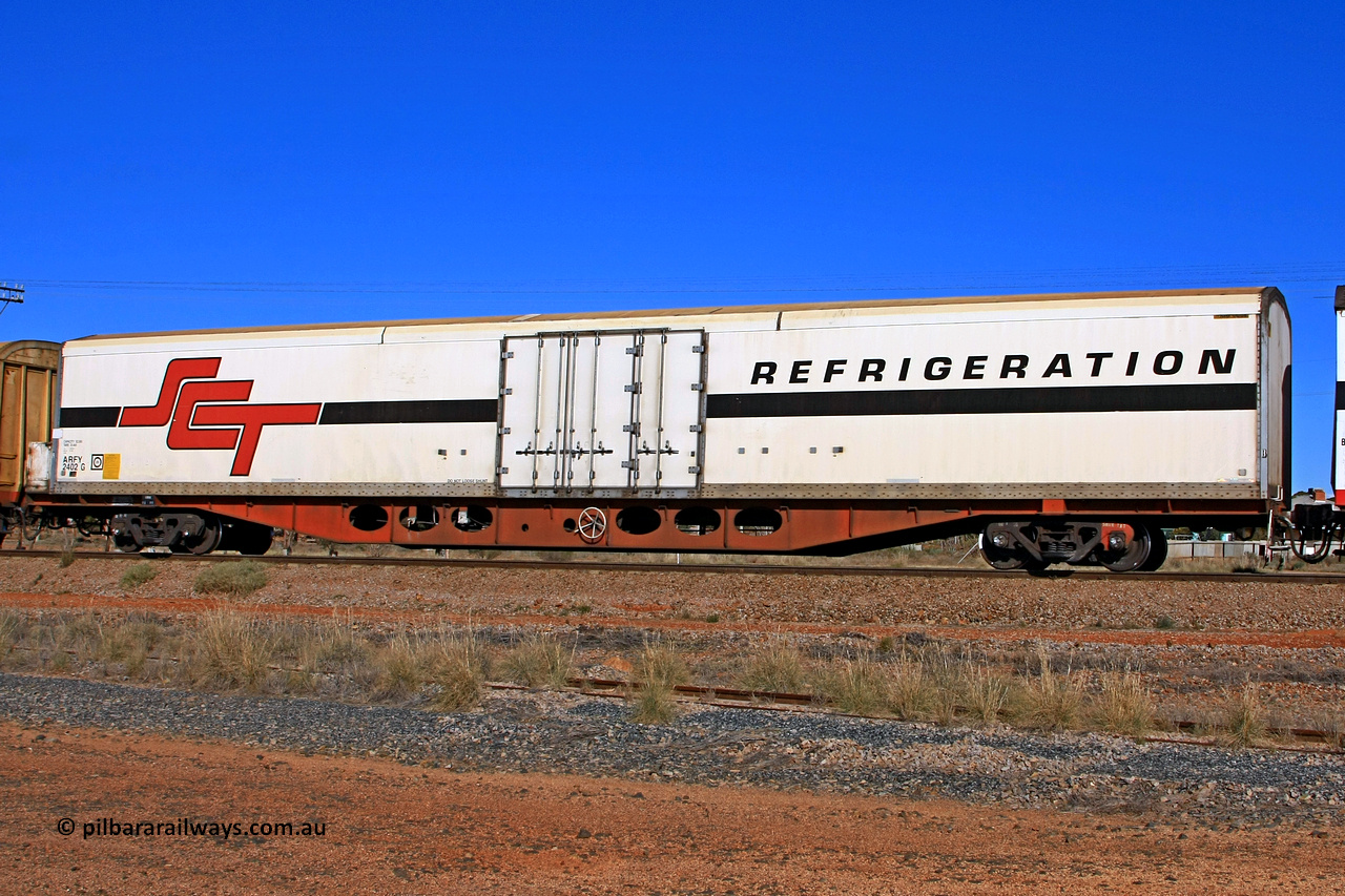 100603 9008
Parkeston, SCT train 3MP9, ARFY type ARFY 2402 refrigerated van with a Ballarat built Maxi-CUBE body mounted on an original Commonwealth Railways ROX container waggon built by Perry Engineering SA in 1971, recoded to AQOX, AQOY and RQOY before having the Maxi-CUBE refrigerated body added circa 1998 for SCT service.
Keywords: ARFY-type;ARFY2402;Maxi-Cube;Perry-Engineering-SA;ROX-type;AQOX-type;