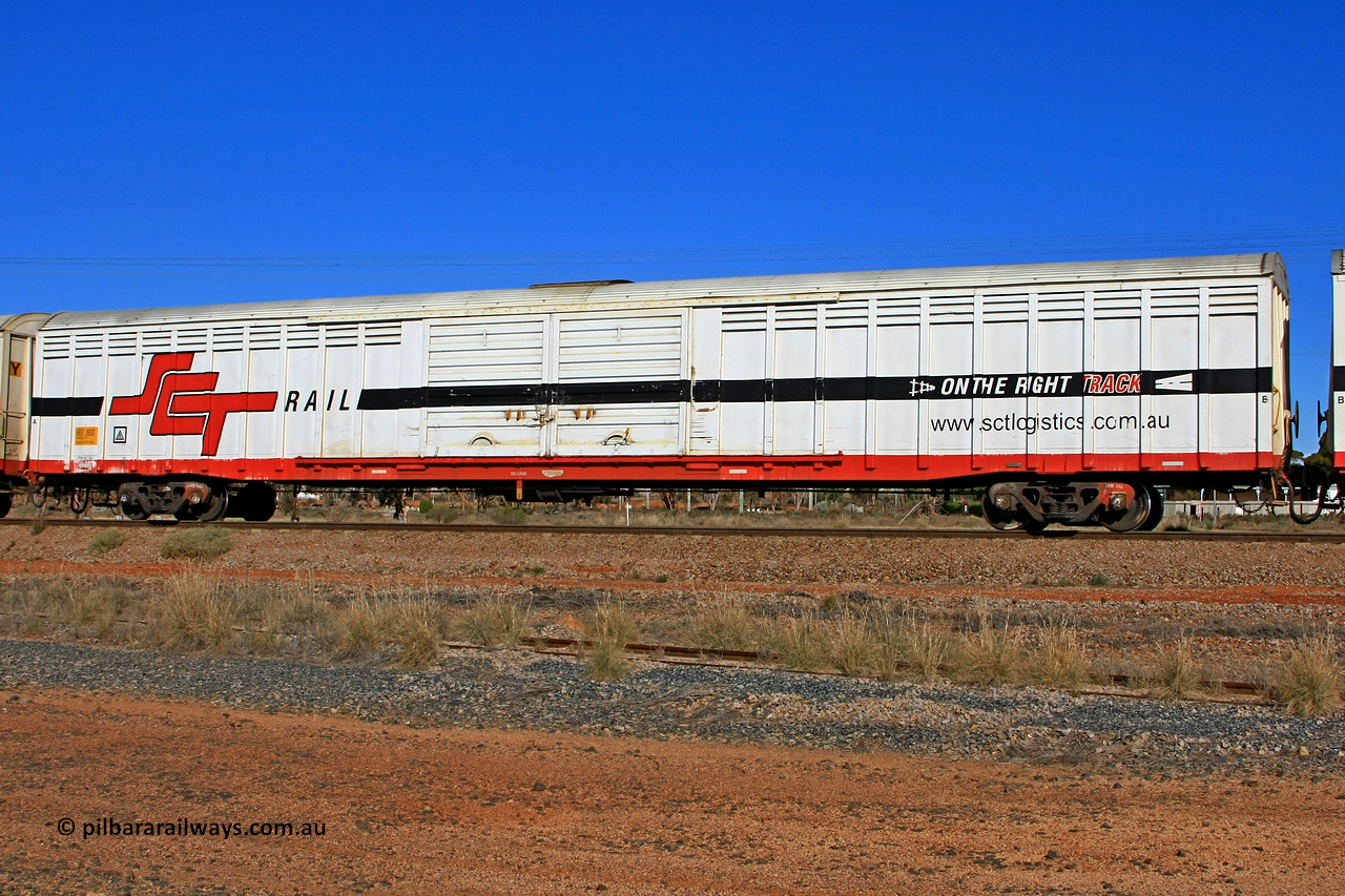100603 9025
Parkeston, SCT train 3MP9, ABSY type covered van ABSY 2683, one of a batch of fifty made by Comeng WA as VFX type 75' covered vans in 1977, recoded to ABFX then ABFY type, to SCT then Gemco WA upgraded it to ABSY type in 2004/05, seen here with the silver corrugated roof fitted.
Keywords: ABSY-type;ABSY2683;Comeng-NSW;VFX-type;ABFX-type;ABFY-type;